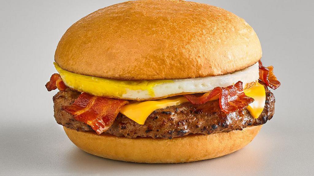 Hangover Burger · 6 oz beef burger, fried egg, bacon and American cheese on a bun
