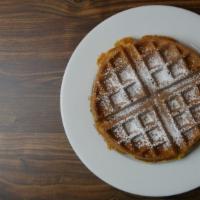 Waffles · Served with butter and maple syrup.