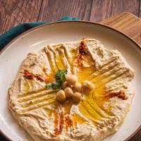 Hummus · Select delicious chickpeas mashed with extra-virgin olive oil and served with warmed pita br...