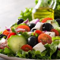 Greek Salad · Romaine lettuce, tomatoes, cucumbers, red onions, black olives, grape leaves, sweet peppers,...