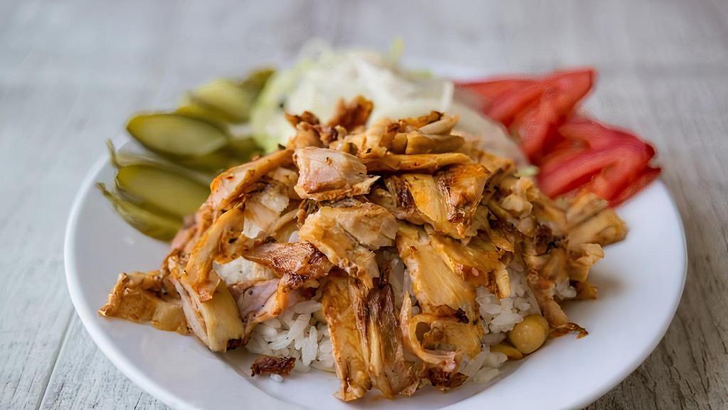 Chicken Shawarma Entree · Tasty treat! Shredded chicken breast marinated in our unique family recipe and grilled to such a savory taste served with brown rice & lentil soup.