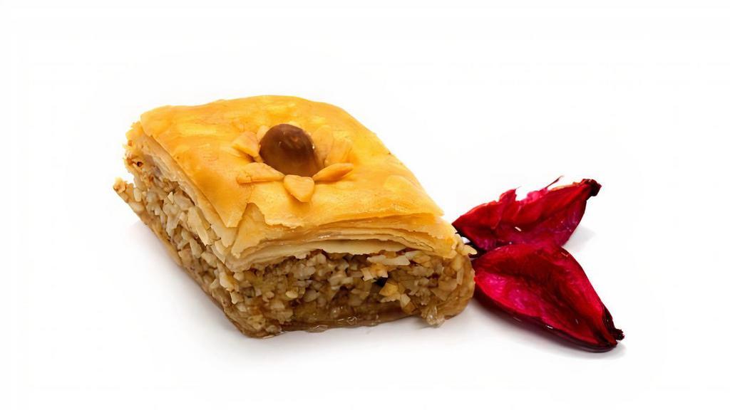 Baklava · This sweet layered pastry dessert is made of a gentle flaky filo pastry, filled with chopped nuts, and sweetened with honey. You can't end a savory Middle Eastern meal better than this classic. If you haven't had it try it! You'll love it If you have, you know you deserve it!