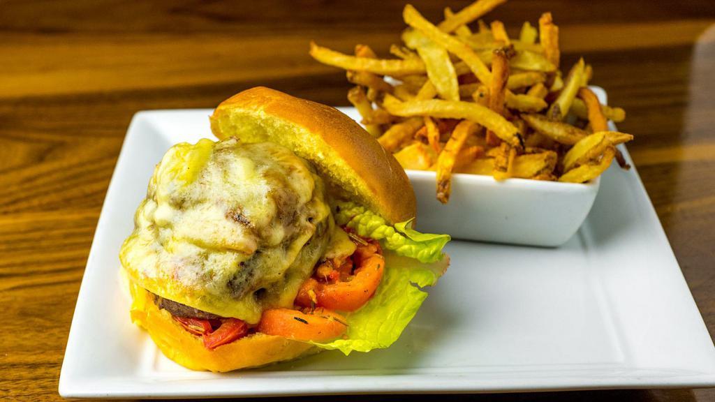 Le Monde Burger  · Natural farm-raised beef gruyere, lettuce, lettuce, tomatoes, caramelized onions, hand out fries