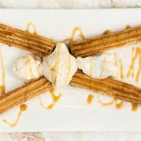 Mexican Churros  · Will a scoop of Vanilla Ice Cream