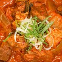 Kimchi Jjigae 김치 찌개 泡菜汤 · A spicy stew made with sour kimchi, fatty pork, and chunks of tofu and green onion. 用发酵完熟好的酸...