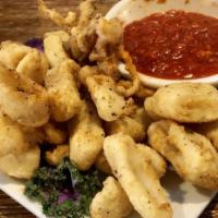 Fried Calamari · With our famous homemade tomato sauce.
