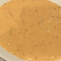 Pint Seafood Bisque · creamy base with shrimp, scallops, crabmeat, and lobster