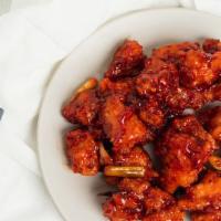 Crispy Chicken With Honey And Dried Red Chili · Spicier. Crispy fried chicken tossed with a honey and chili sauce.