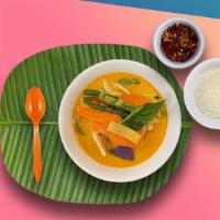 Red Curry · Spicy red curry paste, coconut milk, eggplant, bell peppers, bamboo shoots, carrots, string ...