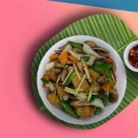 Pad Ginger · Sauteed ginger, onions, scallions, mushrooms, bell peppers, baby corn and carrots in a light...