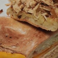 Chicken Sandwich · Shredded chicken with sharp cheddar cheese, in a fresh baked ciabatta bread.