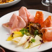 Piatto Del Salumiere · Assorted cured meats and cheeses.