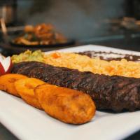 Carne Asada  · Grilled skirt steak served w/ sweet plantains, guacamole & pico de gallo