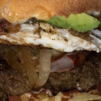 Especial · Beef, smoked pork chop, bacon, ham, cheese, fried egg, avocado, grilled onion, lettuce, toma...
