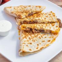 Chicken And Steak Quesadilla · Juicy marinated chicken and steak with cheese, onions, peppers with a side of salsa and sour...