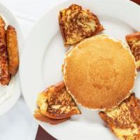 P. Combo · Two pancakes, two french toast, two eggs two ham, two bacon two sausage.