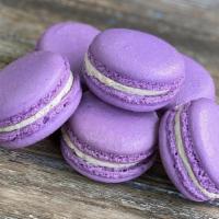 Lavender Chai Macaron · Lavender colored macarons filled with chai cream.