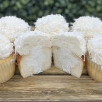 Coconut Cream Pie · Coconut cake filled with coconut cream, then topped in coconut buttercream!