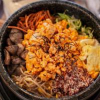 Beef Bibimbap In Hot Stone 韩国牛肉石锅拌饭 · Korean rice dish.
