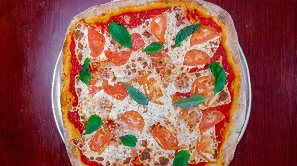 Grandma Deep Pan Pizza · Fresh mozzarella cheese, tomatoes, and garlic.