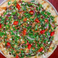 Pizza Milanese · Baby greens, fresh mozzarella cheese, red onions, cherry tomatoes, chicken cutlet, balsamic ...
