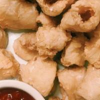 Fried Calamari · Fried squid (calamari) is quickly deep-fried, keeping it crunchy on the outside and simply p...