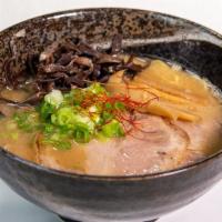 Tonkotsu Shoyu Ramen · Creamy pork broth with soy sauce flavor and straight yellow noodles, topped with pork slices...