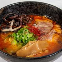 Tonkotsu Spicy Ramen · Creamy pork soup with spicy chili flavor, served with straight yellow noodles and ra-yu chil...