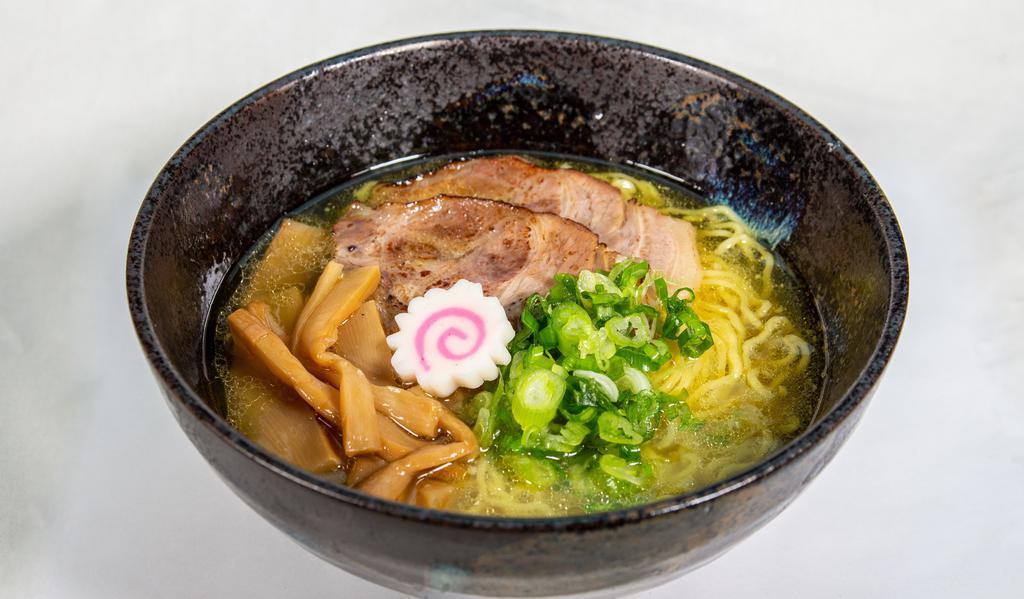 Chicken Shio Ramen · Clear chicken broth with salt flavor and wavy yellow noodles, topped with pork slices, scallions, menma bamboo shoots, and a naruto fish cake.