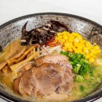 Tonkotsu Miso · Pork broth with homemade miso flavouring, topped with two slices of pork, scallions, menma b...