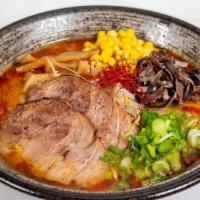 Tonkotsu Spicy Miso · Pork broth with homemade miso mixed with spicy flavouring, topped with two slices of pork, s...