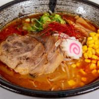 Chicken Spicy Miso · Chicken broth with homemade miso mixed with spicy flavouring, topped with two slices of pork...