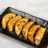 Vegetarian Gyoza Dumplings  · Six pieces of vegetable filled dumplings