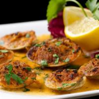 6 Baked Clams · Cooked in a white wine lemon sauce and covered with breadcrumbs.