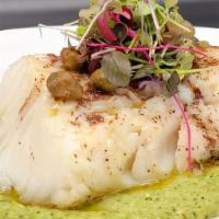Broiled Chilean Sea Bass · Broiled sea bass with a touch of homemade white wine and soy sauce.