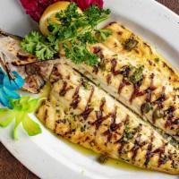 Grilled Branzino · Whole Mediterranean bass served with garlic, parsley, capers and olive oil.