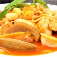 Empire'S Seafood Pasta · Sautéed calamari, shrimp, clams and fish of the day in white wine tomato sauce.