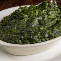 Creamed Spinach · Cooked to a creamy texture with a mixture of homemade ingredients.