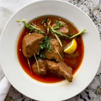 Goat Curry (Baby Goat) · Authentic goat curry cooked with Pakistani spices and herbs.
