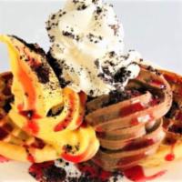 Ice Cream Waffles · any 3 flavors of ice cream w/ buttermilk waffles, sauce topping, whipped cream, and cherry