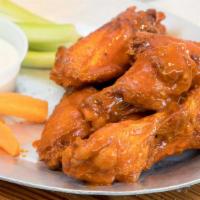 Bbq Wings (Sweet) · 8 perfectly cooked wings  , A choice of Ranch or Bleu cheese, celery n carrots (Due to the s...