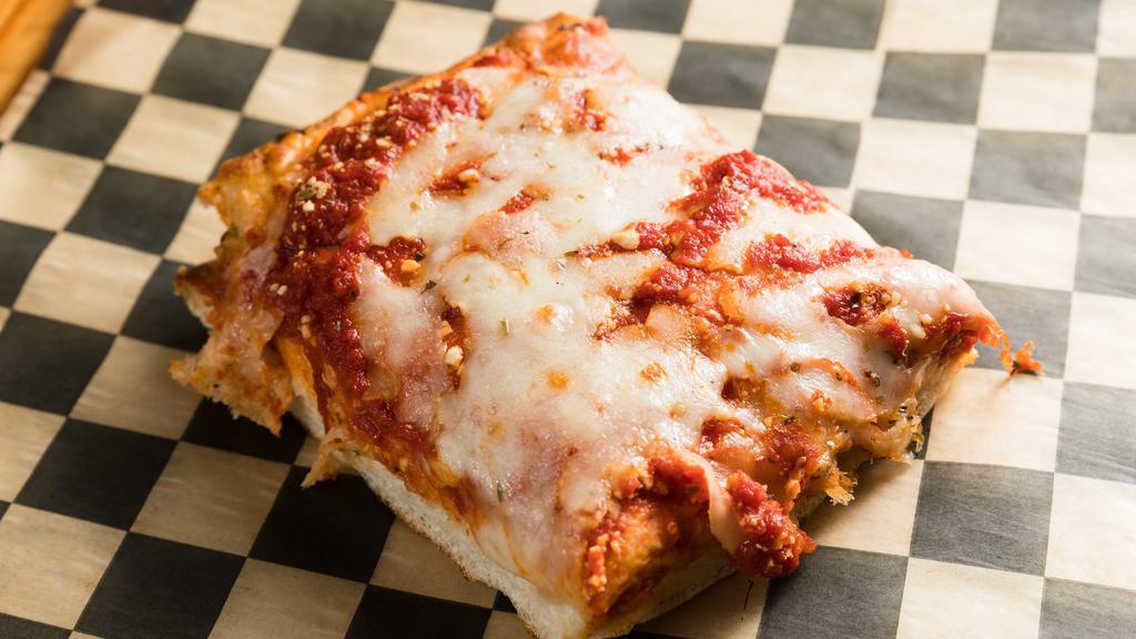 Sicilian Pizza (8) Squares · A nice thick, Lite and airy crust with our homemade sauce, topped w/ Grande Cheese Mozzarella 

 Here at Homeslice Pizzeria we do NOT use any sugar in our sauces or dough. We ferment our dough for 3/5 days to give you that perfect crust. 
Taste the difference.