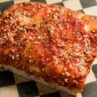 Upside Down Sicilian Pizza (Slice) · A nice thick, Lite and airy crust with fresh mozzarella under our homemade tomato sauce.

He...