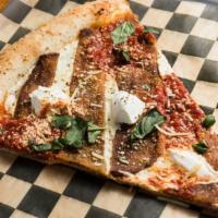 Melanzana Pizza (Slice) · Fried eggplant, chunky tomato sauce, Mozzarella, creamy Ricotta and fresh Basil on top of a ...
