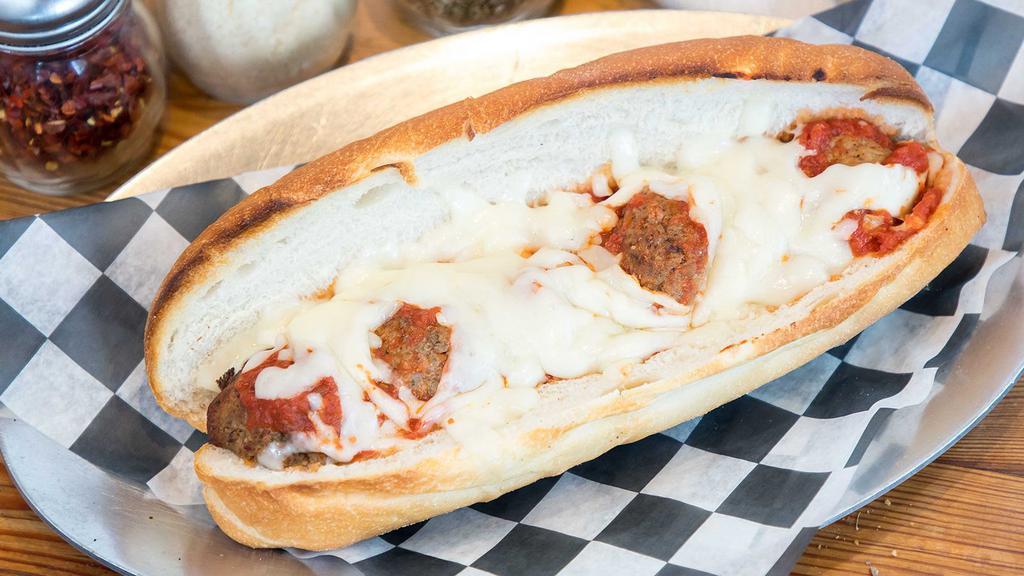 Meatball Parmesan Hero · Meatballs mozzarella cheese and marinara sauce on Italian bread.