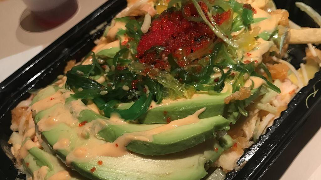 Kani Salad · Crabstick, mango, apple, lettuce, cucumber and spicy mayo topped with masago. (Balsamic house dressing).