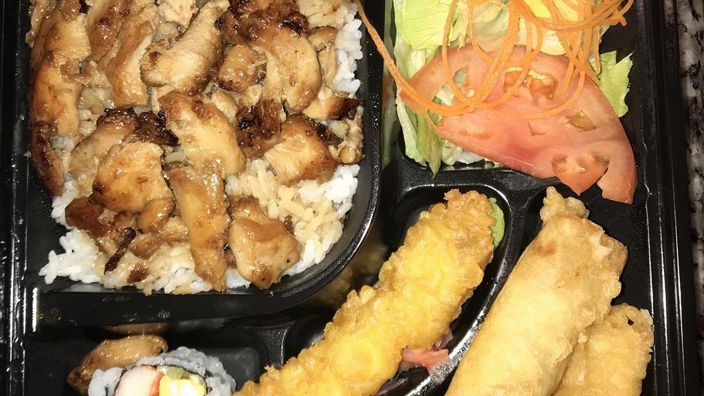 Chicken Bento Box · Served with one shrimp tempura, one vegetable spring roll, four pieces of vegetable tempura, three pieces of California roll, garden salad and steamed rice.