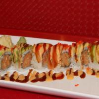 Tokyo Roll
 · Spicy salmon inside, salmon and avocado outside and topped with spicy mayo, eel sauce and to...