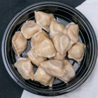 Steam Pork Dumpling(L)                                                                         水饺(大) · 24 pieces.