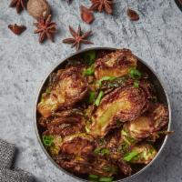 Chili Glazed Brussel Sprouts · Chopped brussel sprouts roasted to a crisp and finished with a chili ginger glaze.